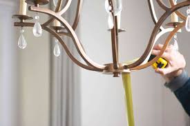 The best way to achieve this is to select a fixture that's diameter is somewhere between half and three quarters the diameter (or width) of the tabletop. Hanging A Dining Room Chandelier At The Perfect Height