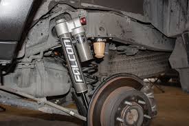 You can use a $30 spring compressor from amazon but they can be unsafe. Falcon Shocks Tow Haul Suspension 5th Gen Toyota 4runner Install