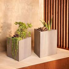 Fiberglass planters are created from a blend of resin and glass fibers. Cityscape Square Resin Planters Products Bookmarks Design Inspiration And Ideas