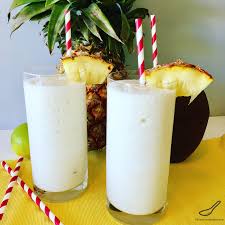 This Family Favorite Pina Colada Recipe Reminds Me Of Summer Vacation So Easy To Blend Fresh Pineapple Jui Virgin Pina Colada Pina Colada Mocktail Pina Colada
