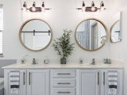 The tub and fittings are by agape and the vintage chair is by ernest race. Bathroom Mirror Ideas Round Brass Mirror In Bathroom Bathroommirror Bathroom Mirror Roundbr Round Mirror Bathroom Blue Bathroom Interior Round Brass Mirror