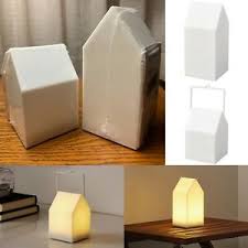 The open wood frame concept allows you to use a real candle with a glass hurricane and gives space to add floral or other decor items around the base. Nip Lot Of 2 Ikea Mini Led White Lanterns Home Decor Vinterfest Indoor Outdoor Ebay