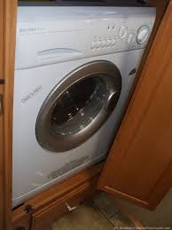 If i were to buy a travel trailer or toy hauler would it be extremely hard to hookup one of these? 2 Popular Rv Washer Dryer Options Combo Unit Vs Stacked Washer Dryer The Rving Guide