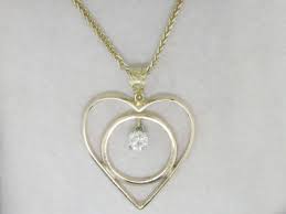 An Option When You Inherit Your Parents Wedding Bands Or A Beautiful Way For A Widow To Honor H Memorable Jewelry Wedding Ring Necklaces Jewelry Wedding Rings