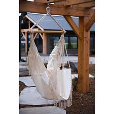 The brazilian hammock, being woven in fabric, is less cooling in the summer heat than the open weave style. Vivere Brazilian Hammock Chair Natural 30 In B500 Rona