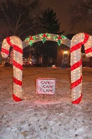 Keeping Up With The Kiddos Christmas Lights In St Louis Hills Candy Cane Lane Angel Avenue And Snowf Candy Cane Christmas Candy Cane Green Christmas Lights