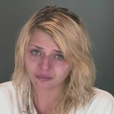 Police: Boulder woman denied blowing heroin smoke in cat's face