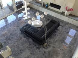 A formerly industrial space becomes a modern dream come true with bright epoxy flooring in the living room and dining areas. Floor Ods Homes Network