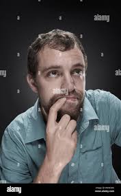Pensive man with beard Stock Photo