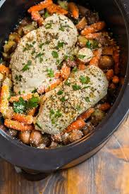 Place the lid on the slow cooker. Crockpot Chicken And Potatoes With Carrots