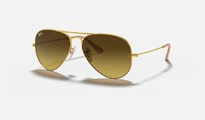 The gold rim has some wear and tear. Ray Ban Aviator Gradient Rb3025 Gold Metal Brown Lenses 0rb3025112 8558 Ray Ban Usa