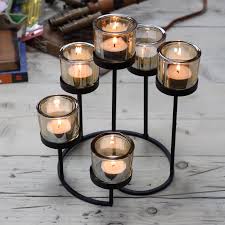 The votive holder helps to pool the wax as it liquefies. Centrepiece Iron Votive Candle Holder 6 Cup Circule Tree Awgifts Giftware Wholesale Awgifts Europe Wholesale Giftware And Aromatherapy Supplier
