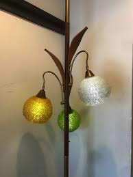 This lamp features a unique tension pole lamp features an adjustable brass pole which adjust to the size of you ceil. Mid Century Danish Modern Teak 3 Spun Lucite Shade Tension Pole Lamp Pole Lamps Lamp Modern Table Lamp