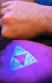 A Blacklight Triforce Legend Of Zelda Duh Black Light Tattoo Light Tattoo Tattoos