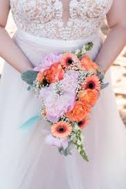 We carry a large variety of fresh cut flowers, exotic flowers and plants from all over the globe. Coral Blue Virginia Beach Wedding Caitlin Gerres Photography Knotsvilla Wedding Ideas Canada Wedding Blog Blue Wedding Bouquet Virginia Beach Wedding Simple Wedding Bouquets