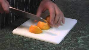 How to cut and segment an orange into slices easily with a knife. How To Cut Orange Wedges Youtube