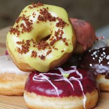 And They Re Armed With Everything From Jelly Classics To Raspberry Sriracha Topped Gourmets New York Food Nyc Donuts Nyc Food