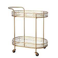 The teagan gold round metal bar cart is equipped with a mirrored top shelf for an extra flair. Deluxe Metal Oval Mirrored Bar Cart In Gold Bed Bath Beyond