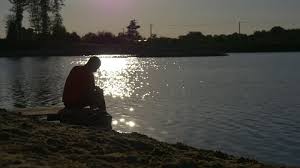 Lack of lighting on hit boat was cause of fatal o'leary crash, opp. A Young Man Sits On Stock Footage Video 100 Royalty Free 27431578 Shutterstock