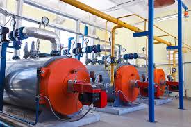 A commercial boiler generating steam for a large facility.