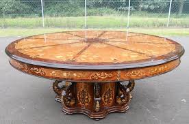 The 63″ round eucalyptus lazy susan dining table fits up to 8 people. Large Round Inlaid Walnut Pedestal Centre Dining Table Sold