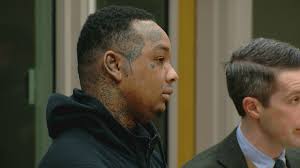 Murder suspect accused of shooting man in the head, setting getaway vehicle 