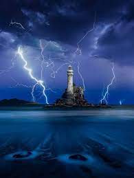 Fastnet Rock Lighthouse Ireland Not Sure If Photo Has Been Manipulated Beautiful Lighthouse Lighthouse Pictures Lighting Storms