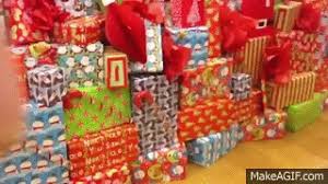 Browse latest funny, amazing,cool, lol, cute,reaction gifs and animated pictures! Christmas Tree With Tons Of Presents On Make A Gif