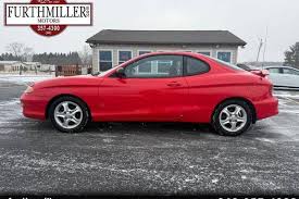 Image result for Cardinal Red 2000 Tiburon