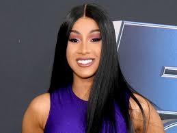 Cardi b shows off her new pink hairstyle on the gram. Cardi B S Curly Faux Hawk Makes Her Look Like Prince S Sister See Photo Allure