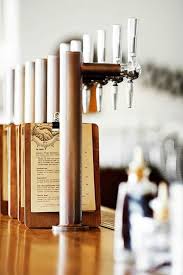 The Most Happening Bar In Copenhagen Flames Included Remodelista Beer Bar Craft Beer Bar Beer Tower