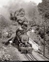 A Train Of Empty L N Hoppers Rolls Downgrade Into Appalachia Across Powell River Distance Bridge And The L N S C Steam Trains Photography Steam Train Tracks