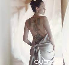 When angelina adopted her first son, maddox, from cambodia, the tat was replaced by a buddhist prayer written in khmer, cambodia's native language. Angelina Jolie Shows Off Her Extensive Back Tattoos In New Guerlain Fragrance Ad