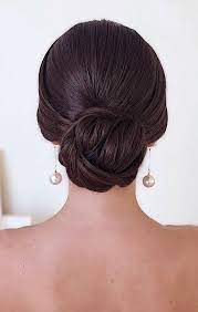 22 Elegant Wedding Hairstyles That Are Right On Trend Sleek Bun Hairstyles Low Bun Wedding Hair Classic Wedding Hair