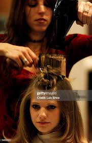 SO.0426.teenbeaut.1.LS. Katie Gill has her hair done by stylist... News  Photo