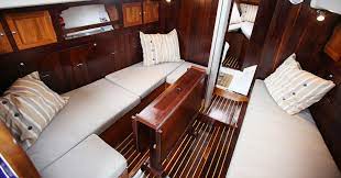 10 Best Sailboats To Live In Life Of Sailing Sailboat interior yacht interior wooden boat building small sailboats boat slip yacht design small boats sailing boat workbench organization sailboat interiors.