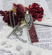 Check spelling or type a new query. Memorial Flower Pendant Necklace With Angel Wing Charm Made From Your Dried Funeral Flowers Memorial Flowers Funeral Flowers Flower Pendant Necklace