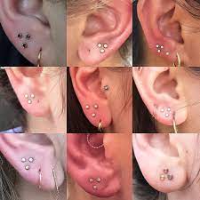 Triple Lobe Piercings Are Not Only Beautiful But Can Help With Uneven Piercing Placements If You Have A Piercing Triple Lobe Piercing Piercing Lobe Piercing