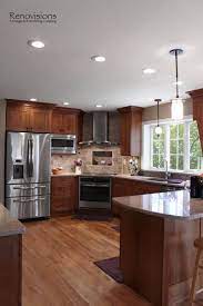 Kitchen cabinet design from homecrest cabinetry includes an eat in. Page Not Found Interior Design Pro Corner Stove Kitchen Layout Cherry Cabinets Kitchen