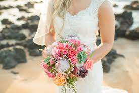 A beautiful maui beach wedding pose idea: View Beautiful Maui Wedding Flowers And Bouquets In Hawaii