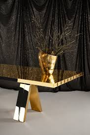 The slab dining table is made from specially crowned oak, a solid piece of generous proportion. Mass Dining Table By Tom Dixon