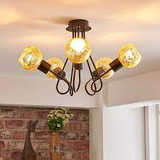 This model uses (1) 60 watt medium base incandescent bulb (a19 bulb type). Rustic Ceiling Lights Country Cottage Style Lights Co Uk