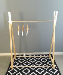 Free shipping on orders over $175 Handmade Children Wooden Clothing Rack Timber Clothes Stand Nursery Decor Child Height Wood Clothing Rack Kids Roo Wood Clothing Rack Wood Clothes Casual Decor