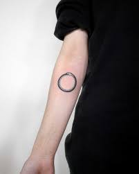Simple Ouroboros Tattoo By Ann Gilberg Tattooed On The Right Forearm Ouroboros Tattoo Minimal Tattoo Hand Tattoos