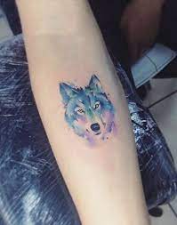 Small Watercolor Wolf Tattoo Inkstylemag Watercolor Wolf Tattoo Small Wolf Tattoo Wolf Head Tattoo