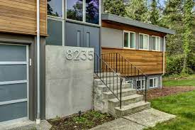The color of the exterior facade is a custom color mixed for this project from sherwin. Modern Split Board Vellumboard Vellum Split Level Remodel Exterior Exterior Remodel Mid Century Modern Exterior