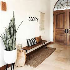 It creates a strong impression with the bold circular console table. What Is A Foyer How To Decorate One Living Spaces