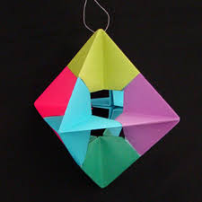 This site contains affiliate links from which we receive a compensation (like amazon for example). Origami Christmas Ornaments