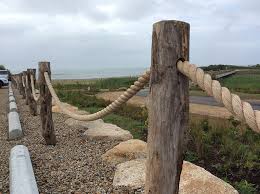 Quite simply, they are guard rails and hand rails that use horizontal cables in place of traditional spindles, glass, mesh, etc. Post And Rope Railing Installed At Squibnocket Beach The Martha S Vineyard Times