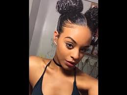 A bun is a type of hairstyle in which the hair is pulled back from the face, twisted or plaited, and wrapped in a circular coil around itself, typically on top or back of the head or just above the neck. Two Buns Tutorial On Natural Hair Youtube